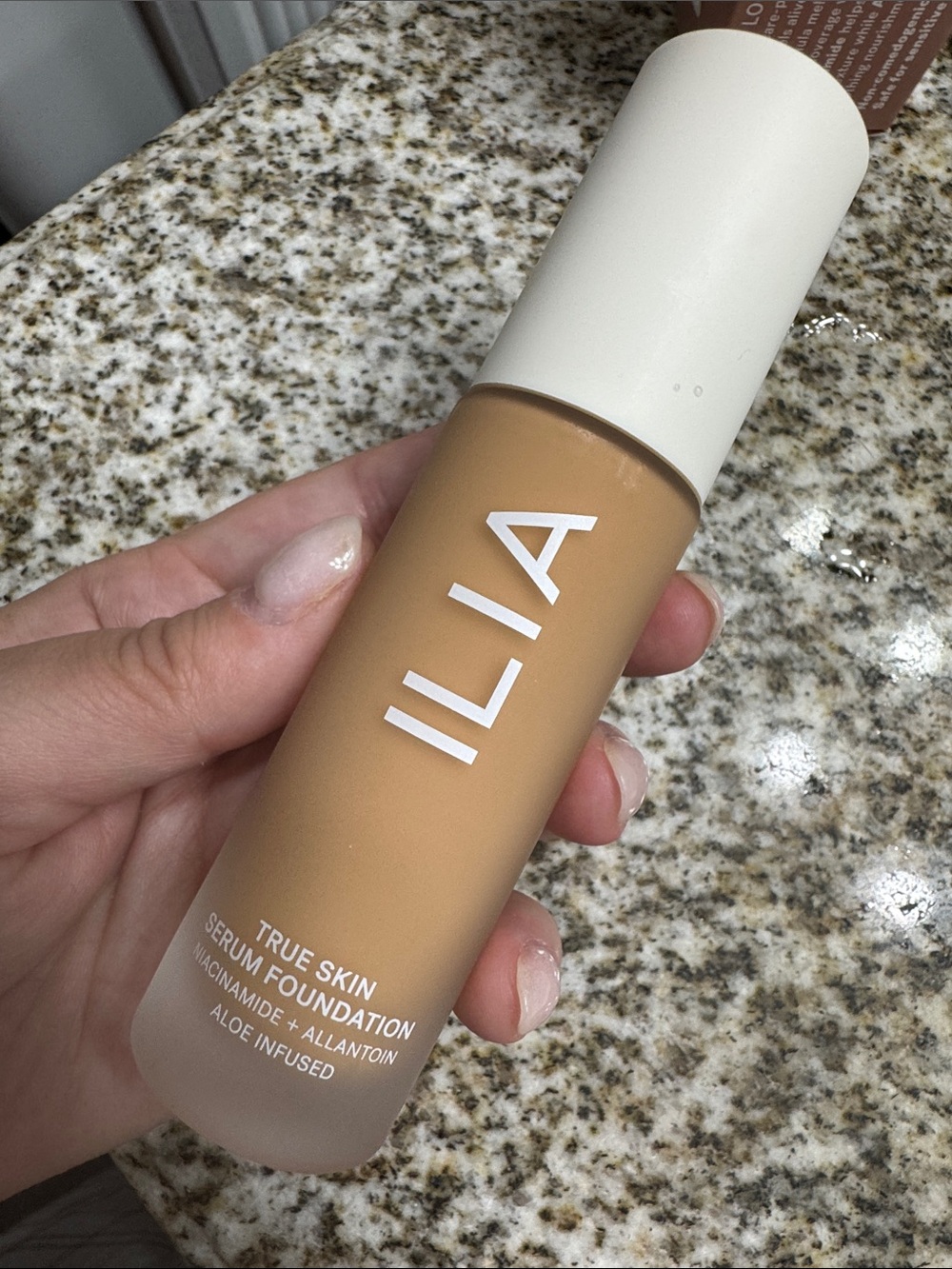 ILIA True Skin Serum Foundation - Warm Tan Bottle
